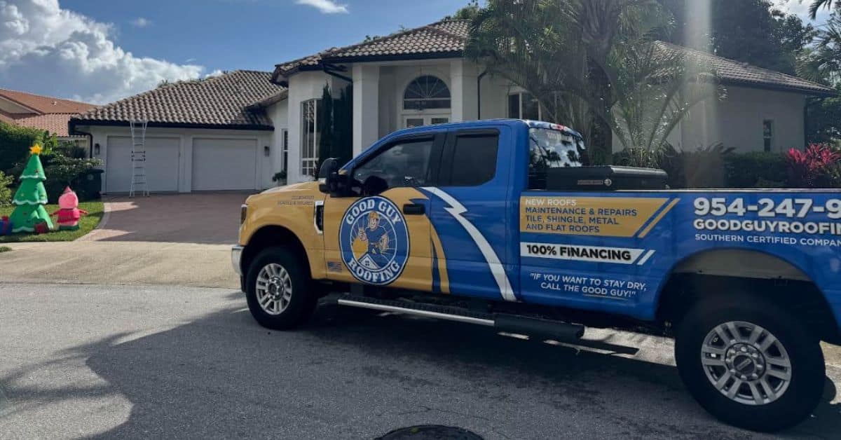 Good Guy Roofing contractor truck parked in front of a South Florida home