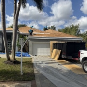 - Roof showing aging shingles and signs that a roof needs replacement