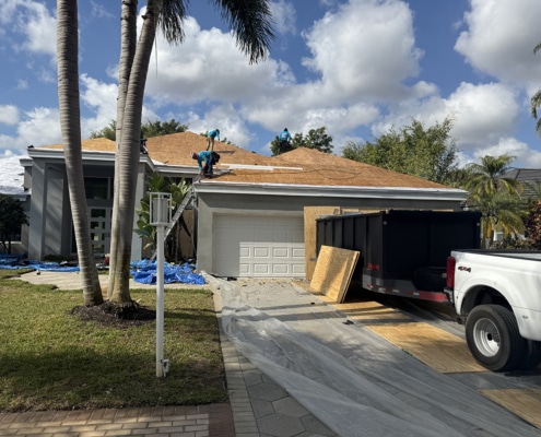 - Roof showing aging shingles and signs that a roof needs replacement